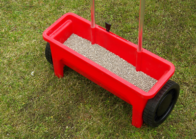 An image of a lawn fertilization tool